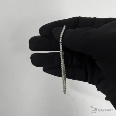 18k white gold tennis bracelet with natural diamond auction image